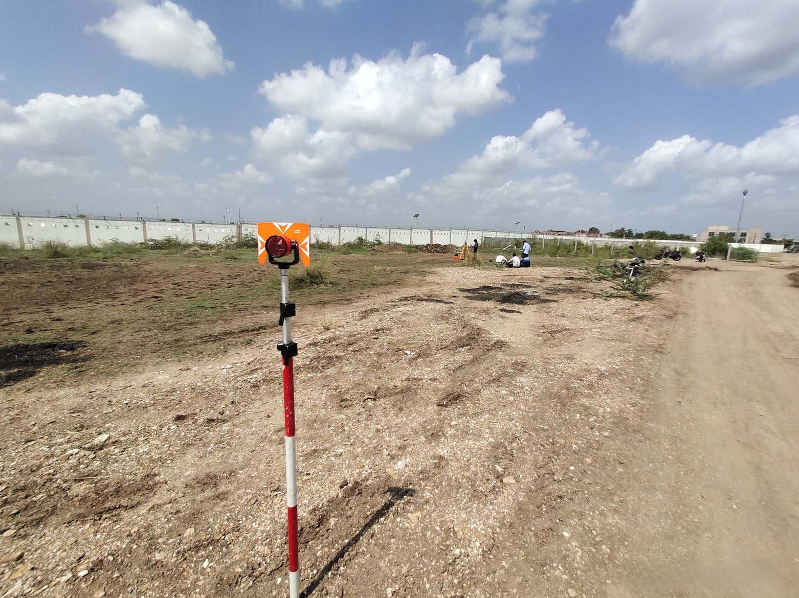 Total station device being used for topographic survey work