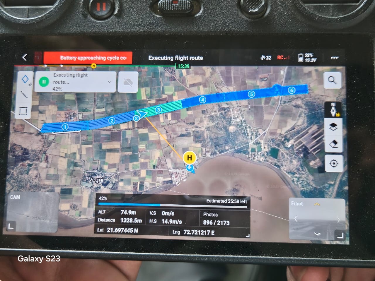 Drone controller screen close up during a VLOS flight for corridor survey
